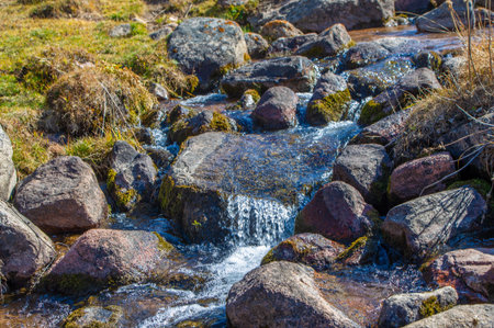Enjoy the beauty of nature with stunning photos. Breathtaking images of flowing water and serene landscapes. Illustrates the harmony and serenity of nature.の写真素材