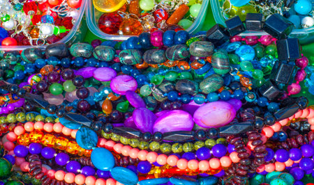 semiprecious stones. Beads pendants decoration. Semi-precious stones are hard gemstones created organically. including lava or ocean hotspots, mines and shells.の写真素材