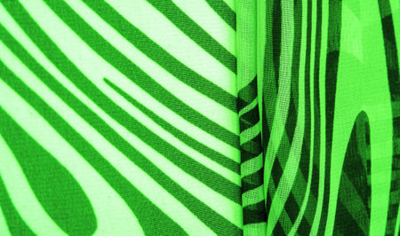 silk fabric, green and white abstract lines. The magical form of abstract white and green pattern. Retro modern decor, textile art, design, texture, background, patternの写真素材