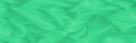 In this serene tableau, folds of green fabric curve and overlap in soft, billowing arcs. The subtle...