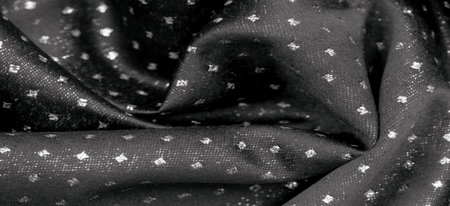 Fabric with a metallic sheen in small polka dots. black. Sometimes you just need to add a fabric, such as our silk.の写真素材