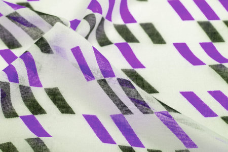 White silk fabric with purple and black geometric rhombus shapes. abstract drawing blue franc,...