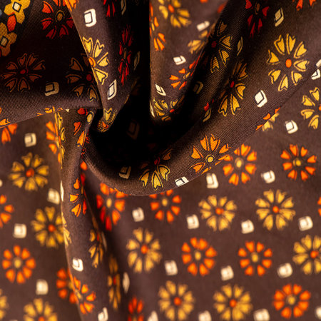 silk fabric of brown color with red and yellow colors, dense fabric, double-sided based on...