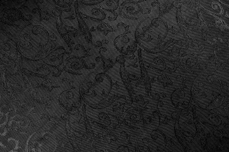 Seamless texture. black color. Made from high quality polyester and silk satin, this satin will embody your inner royal spirit. It is an elegant fabric with a more attractive appearance.の写真素材