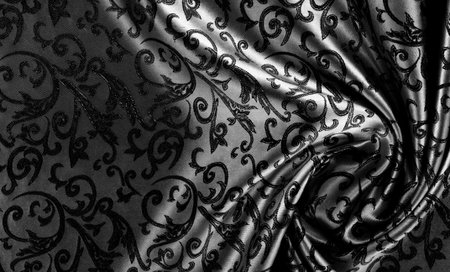 texture, background, pattern, black silk fabric with a paisley pattern. based on traditional Asian elementsの写真素材