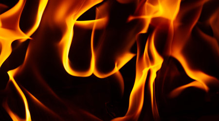 Fire in the fireplace. The illuminated area around the fire creates its own small zone In the...