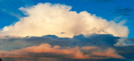 Broken dawn. Crimson clouds, strong red and pink streaks indicate tall clouds reflecting light at...