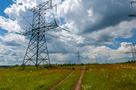 Silhouette of high voltage poles, power tower, electricity pylon, steel trellised tower, in the afternoon in the European part. Texture high voltage pillar, overhead power lineの写真素材