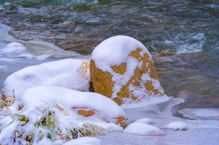 The river freezes in winter. Winter makes me think. As the sun rises later and sets earlier, the hours you can spend on the river are getting shorter.の写真素材