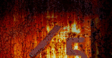 Rust on metal. Texture, background, pattern. When iron comes into contact with water and oxygen, it rusts. If salt is present, such as in seawater or salt spray, iron tends to rust more rapidly.の写真素材