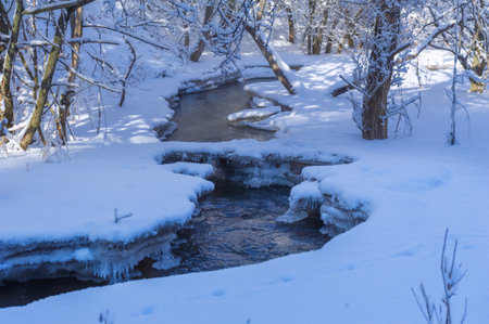 The river freezes in winter. A real winter fairy tale when this wonderful river freezes. Usually considered a beautiful natural heritage, turned into a fairy taleの写真素材