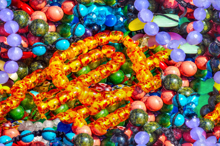 Seamless texture of semi-precious stones. saying Beads pendants jewelry. Semi-precious stones are...