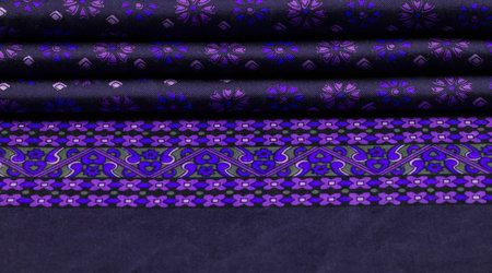 silk fabric of dark blue color with blue and purple flowers, dense fabric, double-sided based on...