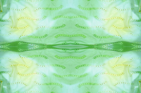 Seamless kaleidoscope. Fabric silk green-blue shades. Vibrant colors and scalloped shapes create a...