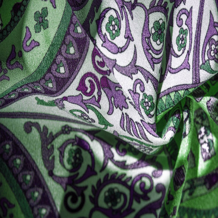 Silk fabric, royal monogram, white color, azure green on the fabric. your design will be imbued with the spirit of the Middle Ages. Textured background patternの写真素材