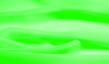 texture - pale green silk. You can turn this fabric into a casual look for any season. Flexible, flowing drapery that flows easily into soft silhouettes allows you to create anything.の写真素材