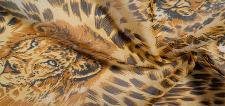 African fabric with silk tiger print. This amazing fabric will help you plunge into the world of the...