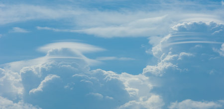 sky, Clouds float into my life, not to bring rain or cause a storm, but to add color to my sunset sky. The sun always shines above the cloudsの写真素材