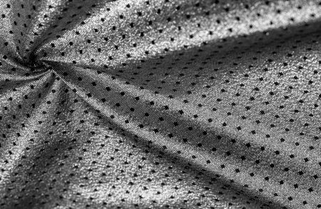 Brocade is golden in color. into a little polka. Brocade is a class of ornate shuttle fabrics, often made from colored silk with gold and silver threads. An important fabric in the Renaissanceの写真素材