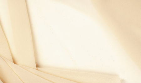 Texture background pattern beige silk. Sometimes you need something that blends in with others to stand out, and our exclusive silk fabrics certainly make the whole range stand out! Create lush designsの写真素材