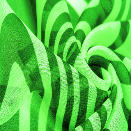silk fabric, green and white abstract lines. The magical form of abstract white and green pattern. Retro modern decor, textile art, design, texture, background, patternの写真素材