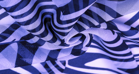 silk fabric, blue and white abstract lines. The magical shape of an abstract blue and white pattern....
