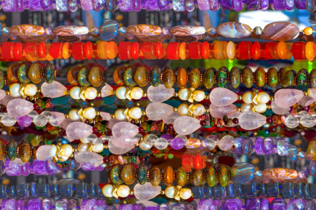 Seamless texture of semi-precious stones. saying Beads pendants jewelry. Semi-precious stones are...