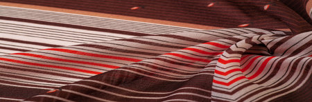 silk fabric, brown background with striped pattern of white and red lines, texture, pattern, collectionの写真素材