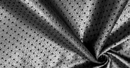 Brocade is golden in color. into a little polka. Brocade is a class of ornate shuttle fabrics, often made from colored silk with gold and silver threads. An important fabric in the Renaissanceの写真素材