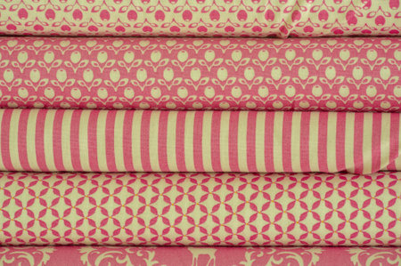 Mix fabrics. Shop counter. Many fabrics of different types. View from above. Printed, cotton, mixed...
