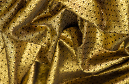 Brocade is golden in color. into a little polka. Brocade is a class of ornate shuttle fabrics, often made from colored silk with gold and silver threads. An important fabric in the Renaissanceの写真素材