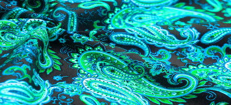 Paisley green pattern on black background In Chinese it is known as âham patternâ In Russia this pattern is known as âcucumbersâ. Boteh is a Persian word meaning bush, bunch of leaves or flower budの写真素材