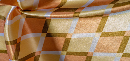 texture background pattern. silk fabric with geometric shapes squares. These figures help to easily...