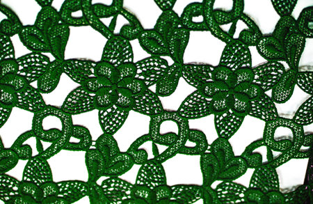 Lace fabric in green. Pure cotton lace with floral pattern embellished with embroidery. Light...