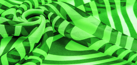 silk fabric, green and white abstract lines. The magical form of abstract white and green pattern....