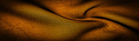 Dark sepia brown-yellow chiffon silk is a soft transparent fabric with a slight roughness (matte, crepe) due to the use of twisted yarn. background textureの写真素材