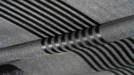 Silk fabric. light transparent silk fabric with stripes of different sizes, black. texture, background, pattern,の写真素材