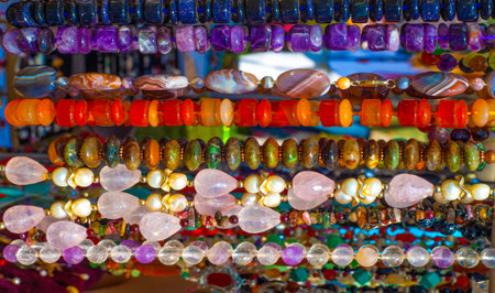 semiprecious stones. Beads pendants decoration. Semi-precious stones are hard gemstones created organically. including lava or ocean hotspots, mines and shells.の写真素材