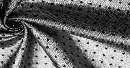 Brocade is golden in color. into a little polka. Brocade is a class of ornate shuttle fabrics, often made from colored silk with gold and silver threads. An important fabric in the Renaissanceの写真素材