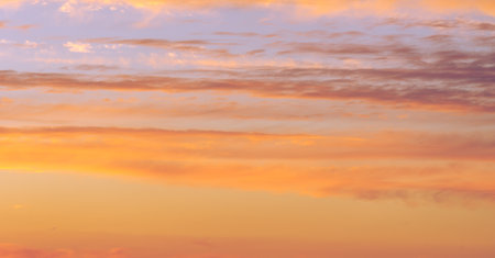 Clouds dawn sunset romance. Proof that few things in life are as beautiful as the setting sun. A picture of the perfect end to the dayの写真素材