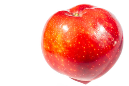 Apple on a white background. Apples are a nutritional powerhouse providing a wide range of health...