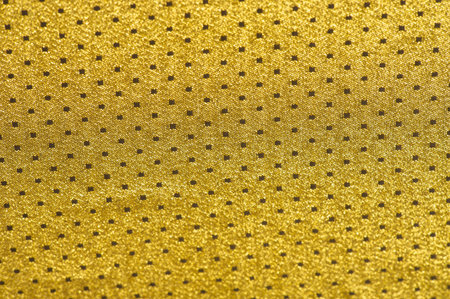 Brocade is golden in color. into a little polka. Brocade is a class of ornate shuttle fabrics, often made from colored silk with gold and silver threads. An important fabric in the Renaissanceの写真素材