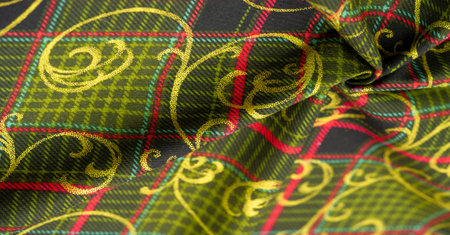 Thick cotton checkered fabric Yellow-red green black stripes on the fabric. Decorated with gold...