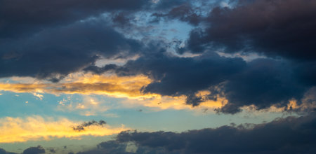 sky, Clouds float into my life, not to bring rain or cause a storm, but to add color to my sunset sky. The sun always shines above the cloudsの写真素材