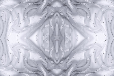 Seamless kaleidoscope. The fabric is silky white and gray. An ultra-modern print and a delicate, airy quality combine in this chiffon with an abstract silk print.の写真素材