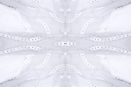 Seamless kaleidoscope. The fabric is silky white and gray. An ultra-modern print and a delicate, airy quality combine in this chiffon with an abstract silk print.の写真素材