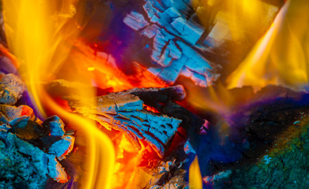 Create a warm and cozy atmosphere with a beautiful fire. Burning logs create natural warmth and atmosphere. Decorate your indoor or outdoor space with mesmerizing flickering flames.の写真素材