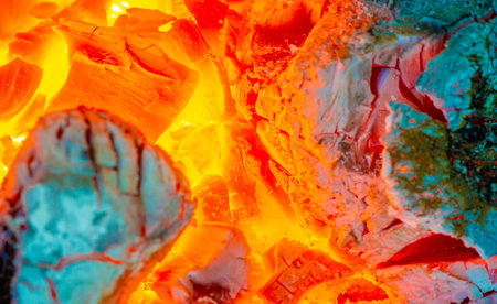 Create a cozy and warm atmosphere with a beautiful fire. Burning logs add atmosphere to any space. Enjoy crackling sounds and the mesmerizing flames of a burning campfire.の写真素材