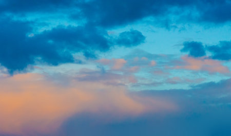 sky, Clouds float into my life, not to bring rain or cause a storm, but to add color to my sunset sky. The sun always shines above the cloudsの写真素材