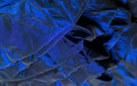 Blue silk fabric. Luxurious, opaque and simply woven, this material features a variety of striping making it the perfect choice for your projects, designsの写真素材